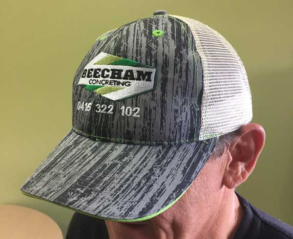 Beecham Concrete Pumping wood printed cap with mesh back, style 4144, embroidered on front.