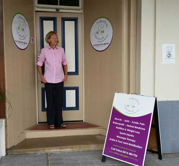 Trisha is a naturopath and the owner of Intelligent Body, Health & Beauty in Boonah Queensland showing off her new wall signs and A-frame sign.