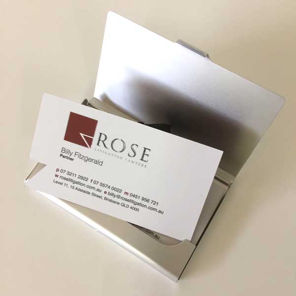 Rose Litigation Lawyers premium business cards, printed full CMYK colour on two sides on 420gsm artboard, matt celloglazer on both sides and a clear gloss foil on the front over the logo.
